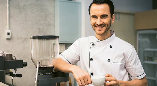 French Man Chef holding coffee cup