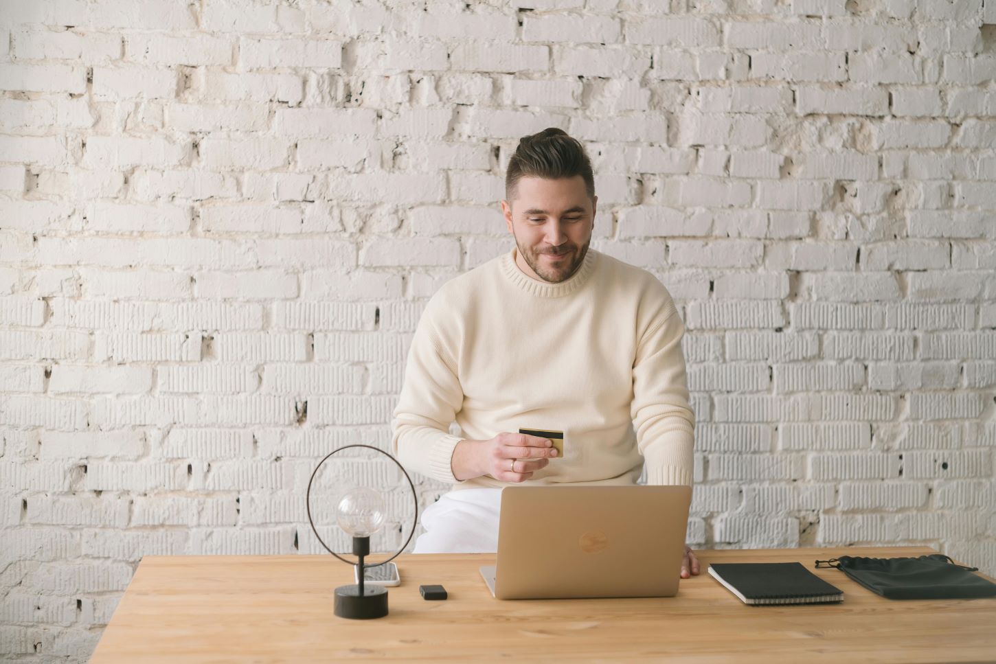 Man Using Online Credit Card Portal Carousel Man Using Online Credit Card Portal Carousel