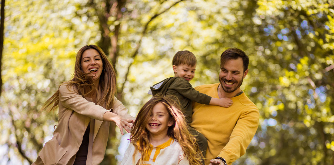 Family Playing In Forest Rrsp