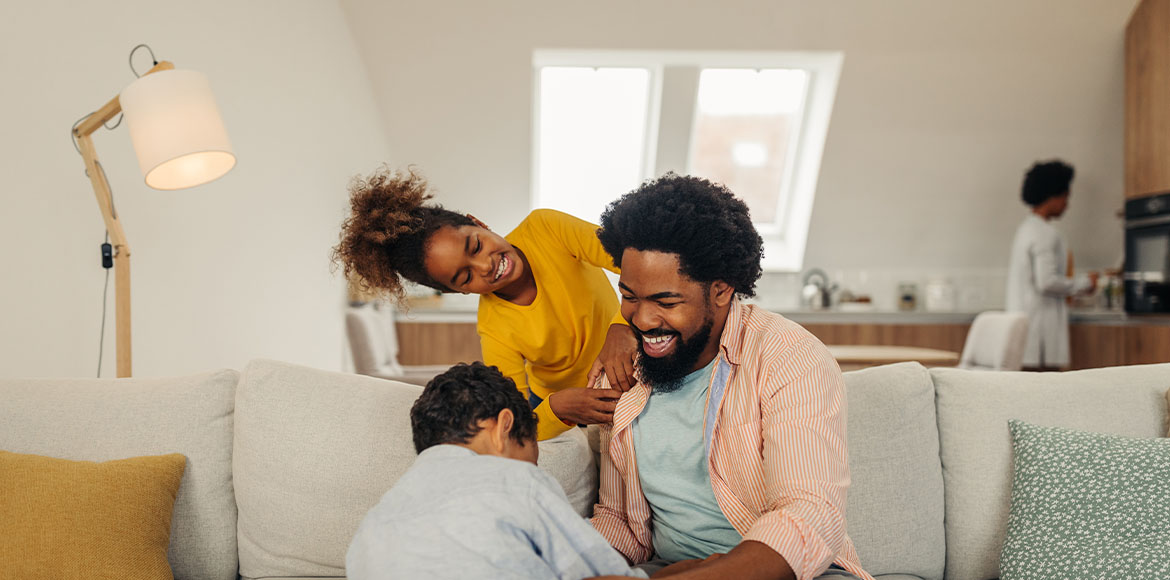 Family Playing In Living Room Tfsa