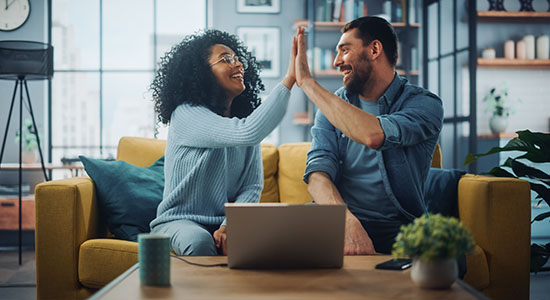Couple Celebrating Line Of Credit Rates Couple Celebrating Line Of Credit Rates