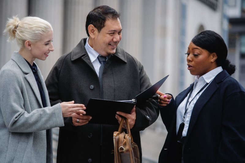 Colleagues Reviewing Files